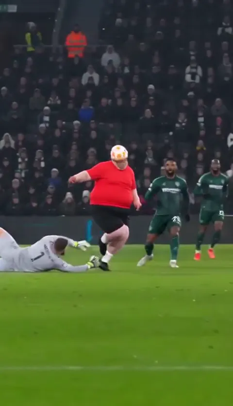 Ozil goal meme: the player chipping the ball over the rushing keeper